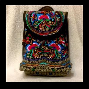 NWOT...Nice Embroidered backpack/handbag.